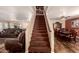 Elegant staircase leading to the upper level at 2442 E Winged Foot Dr, Chandler, AZ 85249