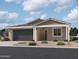 One-story home with a two-car garage and desert landscaping at 25361 N 75Th Ln, Peoria, AZ 85383