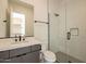 Modern bathroom with a large shower and gray vanity at 25572 N 119Th St, Scottsdale, AZ 85255