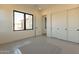 Bright bedroom with closet and window views at 25572 N 119Th St, Scottsdale, AZ 85255