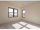 Bright bedroom with large windows and plush carpet at 25572 N 119Th St, Scottsdale, AZ 85255