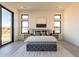 Bright bedroom with large windows, plush bed, and modern nightstands at 25572 N 119Th St, Scottsdale, AZ 85255
