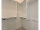Spacious walk-in closets with ample shelving and hanging space at 25572 N 119Th St, Scottsdale, AZ 85255