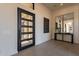 Bright entryway with modern console table and large mirrors at 25572 N 119Th St, Scottsdale, AZ 85255