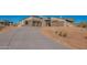 Modern desert home with two-car garage and expansive driveway at 25572 N 119Th St, Scottsdale, AZ 85255
