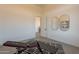 Bright home gym with mirrors and access to another room at 25572 N 119Th St, Scottsdale, AZ 85255