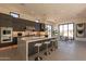 Modern kitchen with large island, stainless steel appliances, and ample counter space at 25572 N 119Th St, Scottsdale, AZ 85255