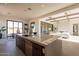 Open concept kitchen with island, stainless steel appliances, and marble countertops at 25572 N 119Th St, Scottsdale, AZ 85255
