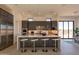 Modern kitchen with large island, stainless steel appliances, and ample counter space at 25572 N 119Th St, Scottsdale, AZ 85255