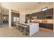 Modern kitchen with large island, stainless steel appliances, and ample counter space at 25572 N 119Th St, Scottsdale, AZ 85255