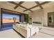 Spacious living room with a modern fireplace and sliding glass doors at 25572 N 119Th St, Scottsdale, AZ 85255