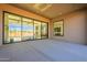 Covered patio with sliding glass doors leading inside at 25572 N 119Th St, Scottsdale, AZ 85255