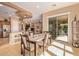 Spacious dining area with sliding glass doors to the patio at 28175 N 123Rd Ln, Peoria, AZ 85383