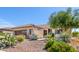 Single-story home with desert landscaping and a two-car garage at 28175 N 123Rd Ln, Peoria, AZ 85383