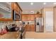 Modern kitchen with stainless steel appliances and ample counter space at 28175 N 123Rd Ln, Peoria, AZ 85383