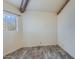 Simple bedroom with wood-look floors and exposed beams at 28243 E Campanella St, Florence, AZ 85132