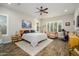 Main bedroom with wood floors and a relaxing sitting area at 2843 E Donald Dr, Phoenix, AZ 85050