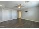 Bedroom with ceiling fan, double closets, and access to bathroom at 2914 E Cactus Rd, Phoenix, AZ 85032
