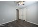 Bedroom with ceiling fan and double door closet at 2914 E Cactus Rd, Phoenix, AZ 85032