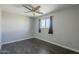 Charming bedroom with ceiling fan and dark gray walls at 2914 E Cactus Rd, Phoenix, AZ 85032