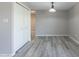 Bright dining room with laminate wood flooring and built in shelving at 2914 E Cactus Rd, Phoenix, AZ 85032