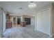 Open concept dining area with laminate flooring and access to kitchen at 2914 E Cactus Rd, Phoenix, AZ 85032