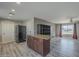 Modern kitchen with a granite island and stainless steel appliances at 2914 E Cactus Rd, Phoenix, AZ 85032