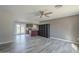 Modern kitchen with granite island, dark wood cabinets, and stainless steel appliances at 2914 E Cactus Rd, Phoenix, AZ 85032