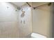 Clean shower stall with tile surround and shelving at 2914 E Cactus Rd, Phoenix, AZ 85032
