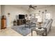 Cozy living room featuring gray sofas, a fireplace, and a large TV at 2972 E Ironside Ln, Gilbert, AZ 85298