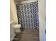 Clean bathroom with shower/tub combo, toilet and vanity at 3810 N Maryvale Pkwy # 1093, Phoenix, AZ 85031