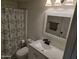 Bathroom features vanity with sink, mirror and lighting at 3810 N Maryvale Pkwy # 1093, Phoenix, AZ 85031