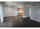 Dining area with dark floors and kitchen view at 3810 N Maryvale Pkwy # 1093, Phoenix, AZ 85031