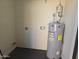 Small laundry room with water heater at 3810 N Maryvale Pkwy # 1093, Phoenix, AZ 85031