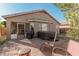 Spacious backyard with patio, hot tub, and grill at 3854 W Yellow Peak Dr, San Tan Valley, AZ 85144