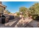 Private backyard oasis featuring a hot tub and seating area at 3854 W Yellow Peak Dr, San Tan Valley, AZ 85144