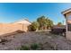 Large backyard with gravel landscaping and hot tub at 3854 W Yellow Peak Dr, San Tan Valley, AZ 85144