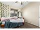 Bedroom with a bed and mirror at 3854 W Yellow Peak Dr, San Tan Valley, AZ 85144