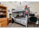 Bedroom with bunk beds, workspace, and ample storage at 3854 W Yellow Peak Dr, San Tan Valley, AZ 85144