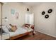 Cozy bedroom with wood bed frame and decorative wall art at 3854 W Yellow Peak Dr, San Tan Valley, AZ 85144