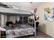 Bright bedroom featuring a full-size bunk bed and a desk at 3854 W Yellow Peak Dr, San Tan Valley, AZ 85144
