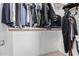 Large walk-in closet with shelving and rods at 3854 W Yellow Peak Dr, San Tan Valley, AZ 85144