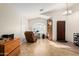 Home gym with treadmill, weights, and wood wall at 3854 W Yellow Peak Dr, San Tan Valley, AZ 85144