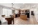 Kitchen with island, stainless steel appliances, and wood cabinets at 3854 W Yellow Peak Dr, San Tan Valley, AZ 85144