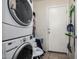 Laundry room with stacked washer and dryer, and extra storage at 3854 W Yellow Peak Dr, San Tan Valley, AZ 85144