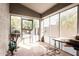 Relaxing screened porch with access to backyard patio at 3854 W Yellow Peak Dr, San Tan Valley, AZ 85144