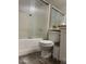 Clean bathroom with shower/tub combo and tiled floor at 42244 W Calle St, Maricopa, AZ 85138