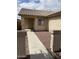 Front entryway with walkway and small, well-maintained yard at 42244 W Calle St, Maricopa, AZ 85138