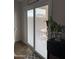 Sliding glass door leading to backyard at 42244 W Calle St, Maricopa, AZ 85138