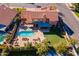 Backyard oasis with pool, putting green, and patio at 6302 E Monte Cristo Ave, Scottsdale, AZ 85254